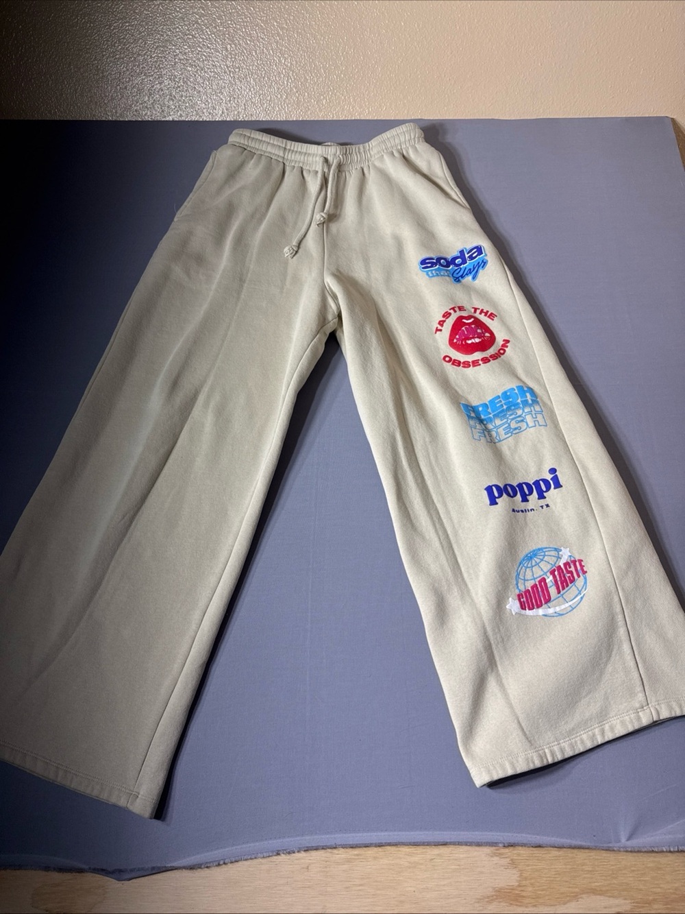 Poppi Beige Graphic Patch Wide-Leg Sweatpants